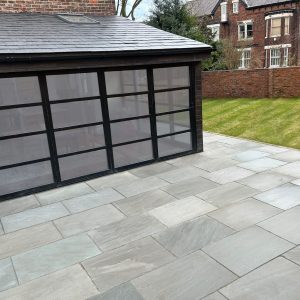 This picture shows Kandla Grey 900x600 Indian Sandstone Paving